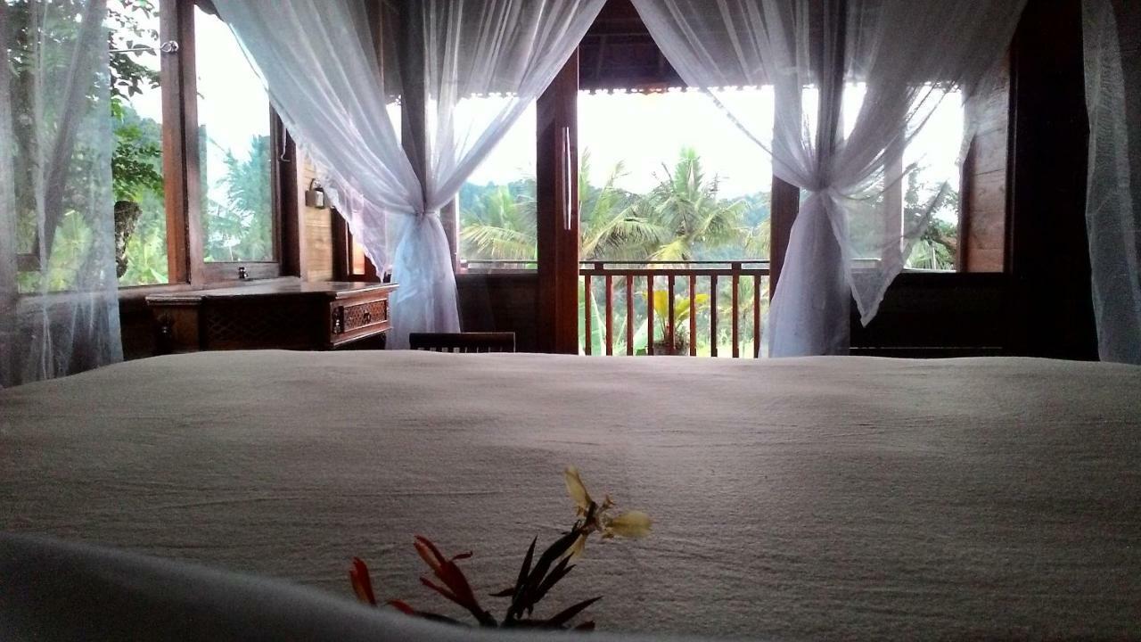 Kubu Shanti Sanda Munduk Buitenkant foto